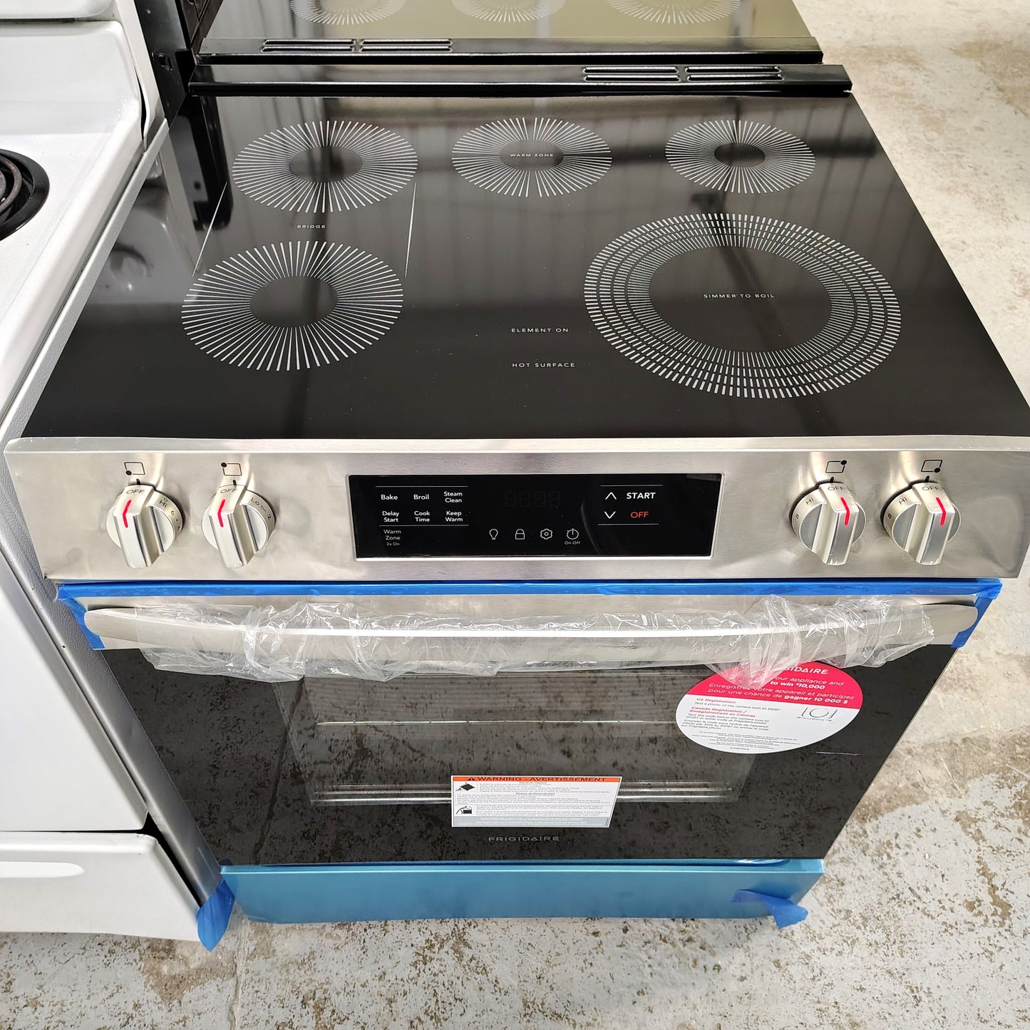 Frigidaire 30 in. 5-Burner Element Slide-In Front Control Electric Range with Steam Clean in Stainless Steel FCFE3062ASE